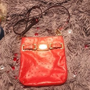 MK pink crossbody crocodile skin print